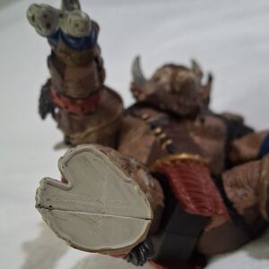 Action Figure with Red and Brown Accents